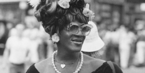 Picture of Marsha P. Johnson a Black trans woman and central leader in the gay liberation movement.