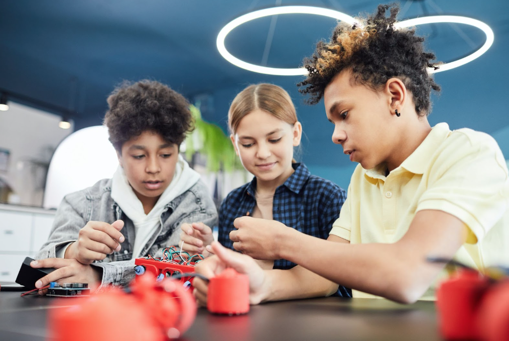 Teens working together in a STEM project